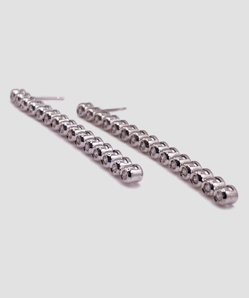 Orecchini tennis in oro bianco con diamanti